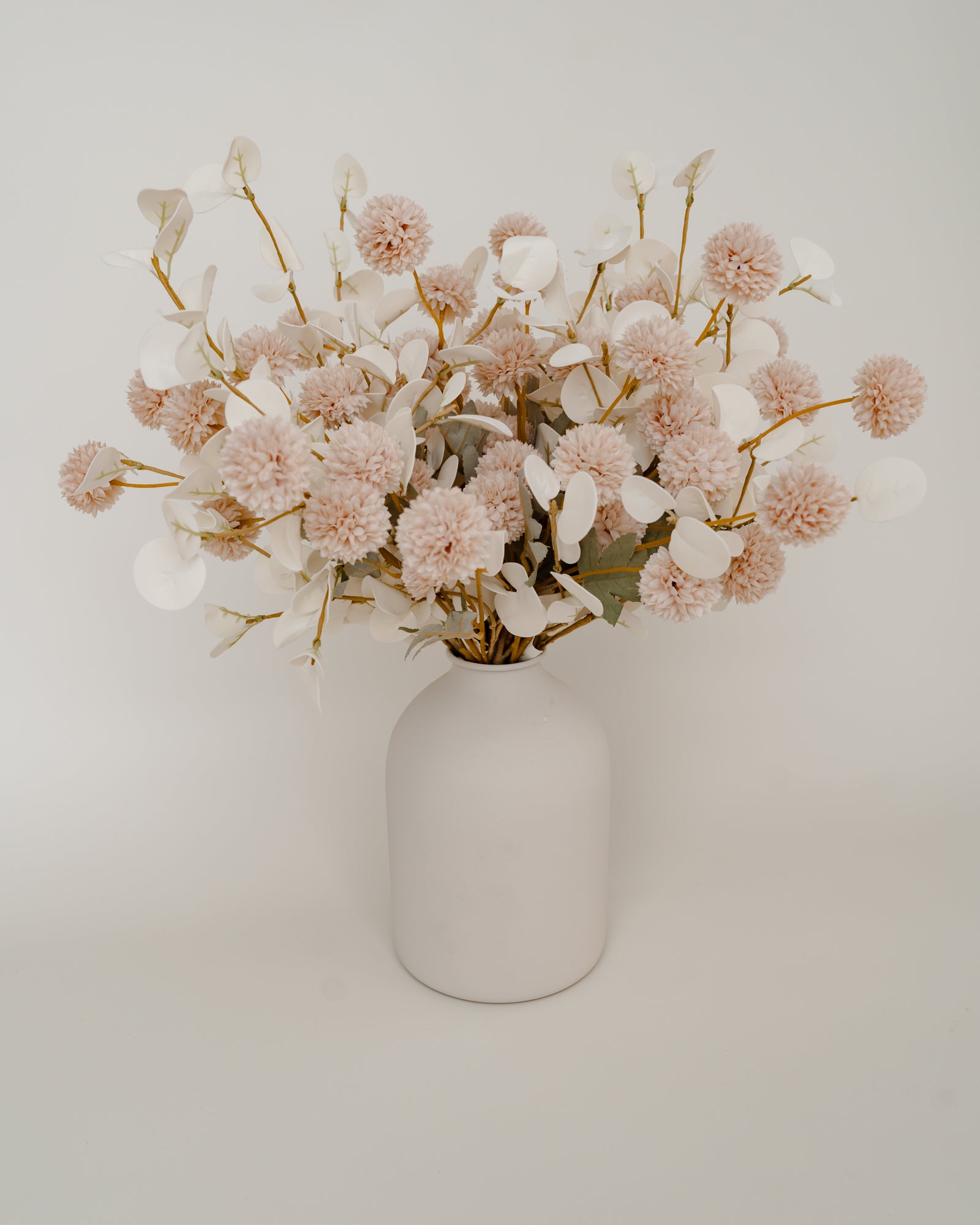 Faux Cream and White Flower Arrangement with White Vase