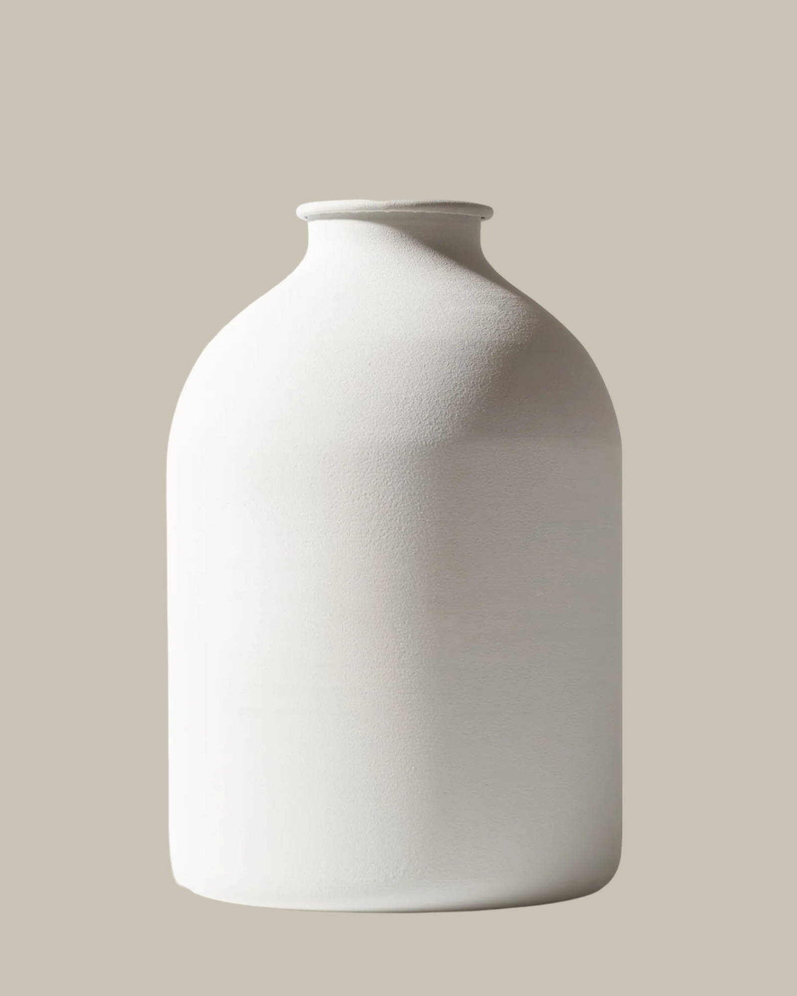 Faux Cream and White Flower Arrangement with White Vase.