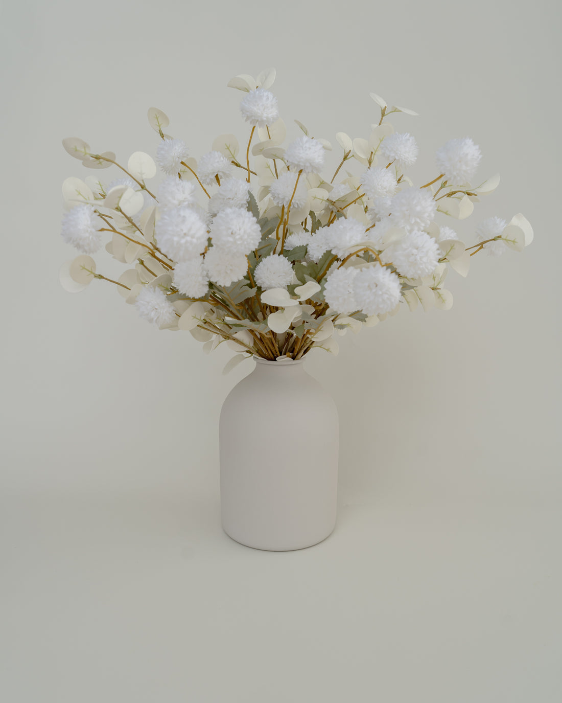 Faux White and White Flower Arrangement with White Vase
