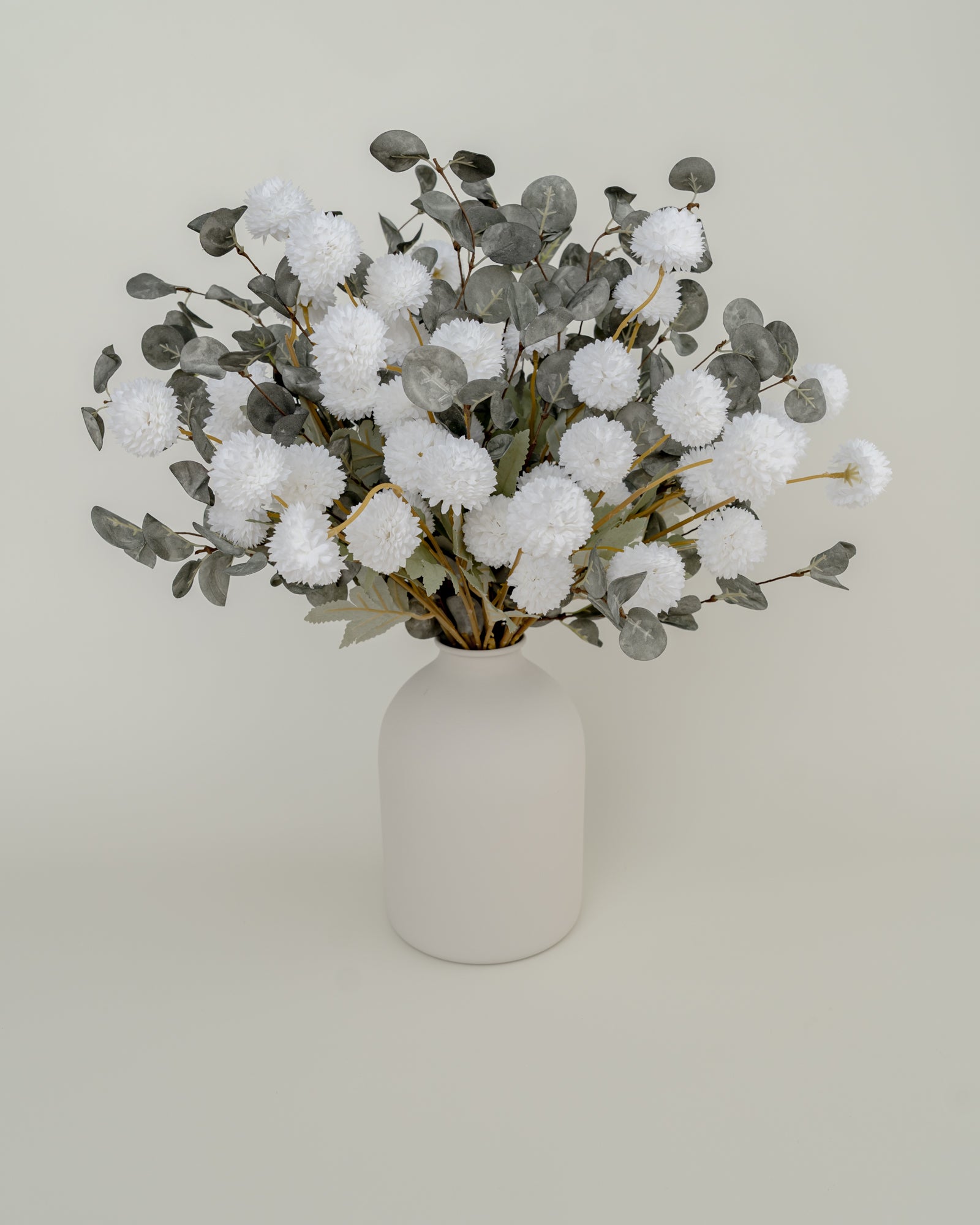 Faux White and Green Flower Arrangement with White Vase