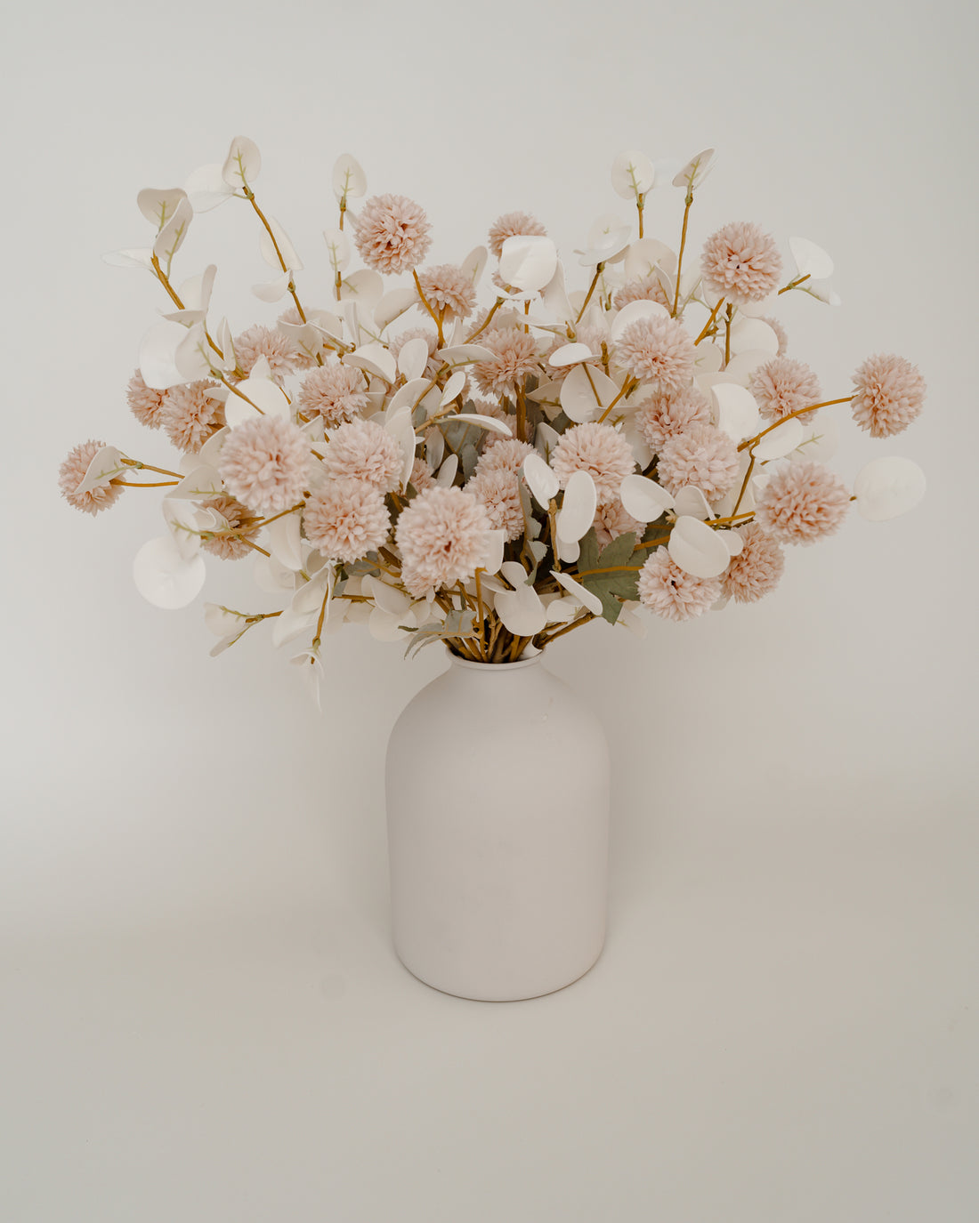 Faux Cream and White Flower Arrangement with White Vase